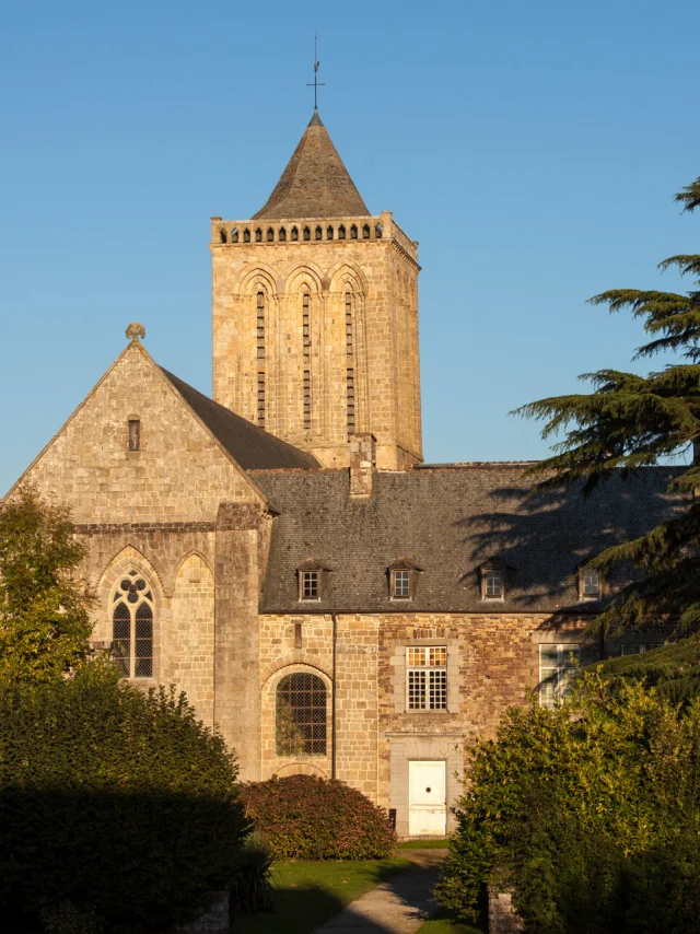 La Lucerne Abbey, 12th-century architecture in a green setting