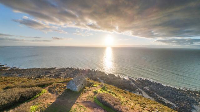 The Vauban hut at Carolles seen from the sky at sunset