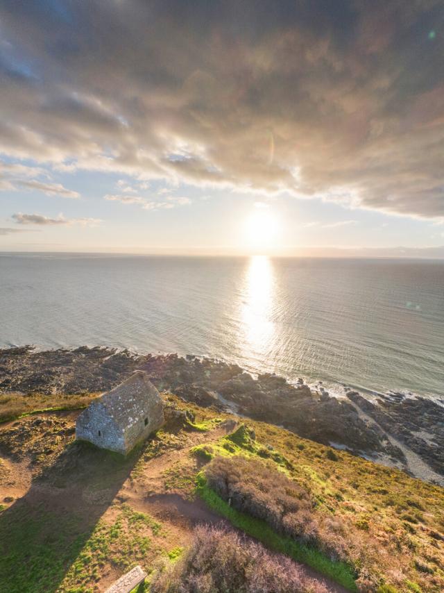 The Vauban hut at Carolles seen from the sky at sunset